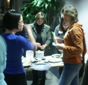 Chatting with Eagranie over sushi at the January 2009 program, with Liessi and Lois in the background