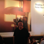 Fellow technical writer Jon Steeves standing in front of Shadow Play, 7'x 9', ink on canvas